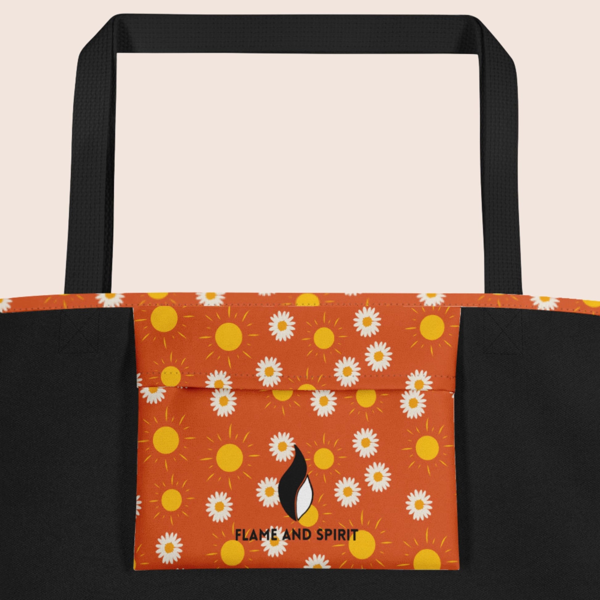 Tote bag non genré, avec affirmation positive en bas de la face avant. Motifs soleils et pissenlits sur fond orange. Signature Flame and Spirit face avant et poche intérieure.